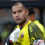 Andritany Ardhiyasa saat mengenakan seragam Persija Jakarta di lapangan.