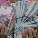 Tampilan layar grafik pergerakan nilai tukar mata uang Rupiah terhadap Dolar Amerika Serikat di pasar keuangan