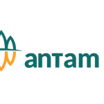 Gedung kantor PT Aneka Tambang Tbk dengan logo Antam yang terpampang di area perkantoran.