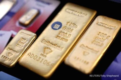 Grafik kenaikan harga emas dunia yang menyentuh rekor tertinggi baru di pasar internasional.