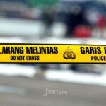 Garis polisi di sekitar area rel Stasiun Jurangmangu pasca insiden kematian seorang siswi