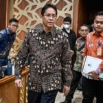 Menteri Keuangan Purbaya Yudhi Sadewa saat memberikan keterangan pers terkait evaluasi satu tahun masa jabatannya.