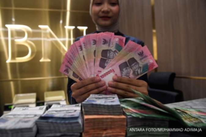 Grafik pergerakan nilai tukar Rupiah terhadap Dolar AS yang melemah di pasar spot